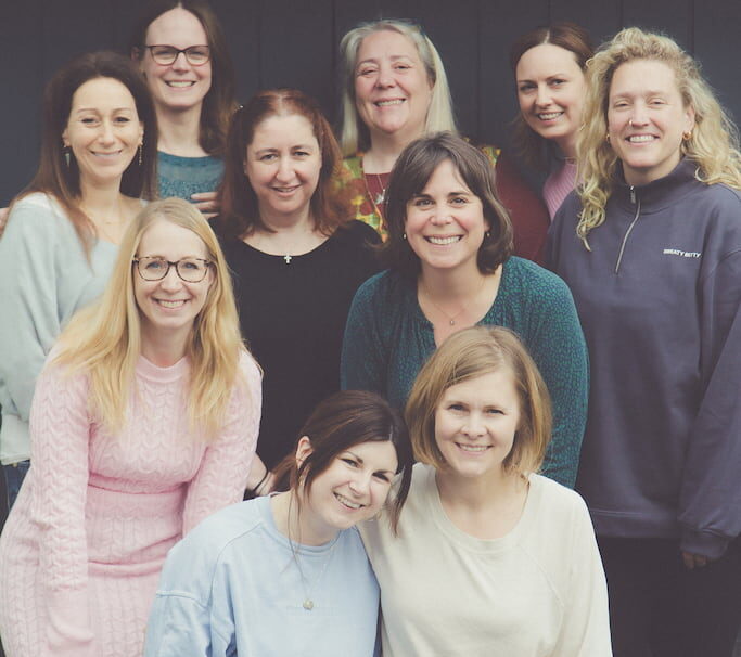 group of 10 women gathered for photo