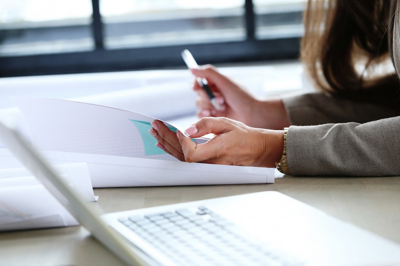 A person checking legal documents